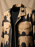 Boys black camel elephant shacket — close-up of elephant block print and gold piping detail