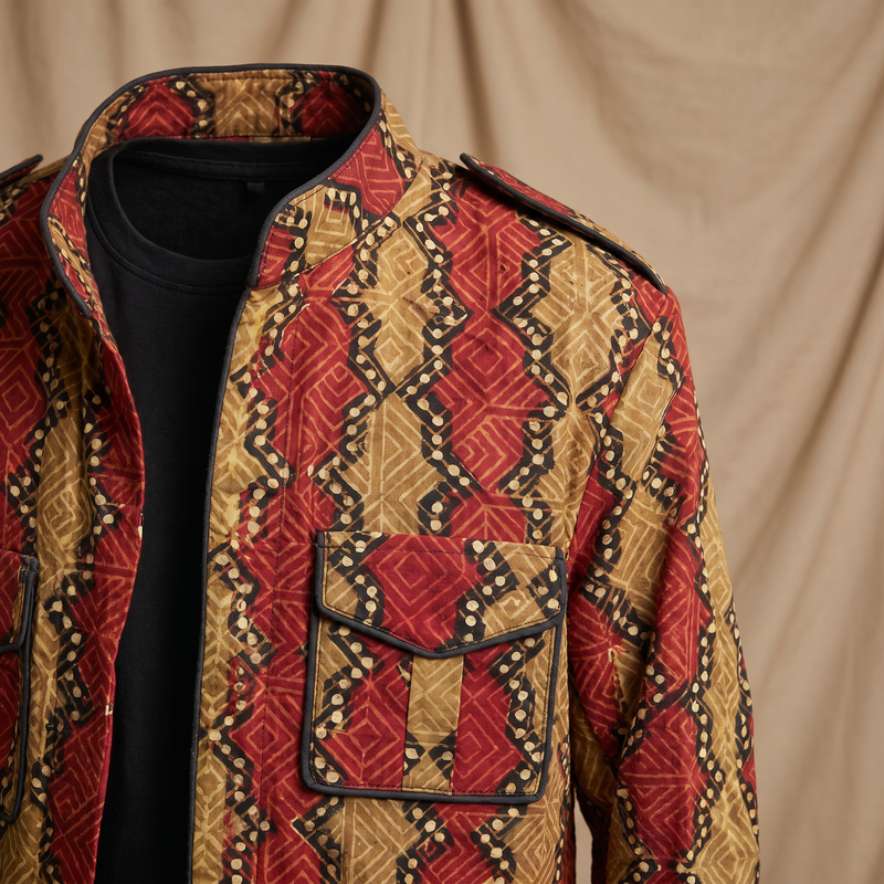 Boys red mustard shacket — close-up of diamond hand block print and black piping detail