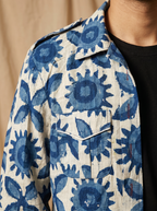 Boys off white blue sunflower shacket — close-up of cobalt blue hand block print and snap button detail