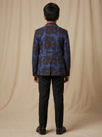 Boys navy blue dark sunflower printed cotton shacket with red piping — back view