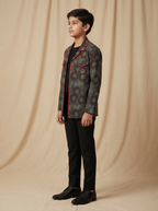 Boys olive grey dark sunflower printed cotton shacket with red piping — side view