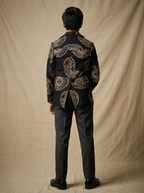 Boys wearing black hand block printed cotton shacket back view