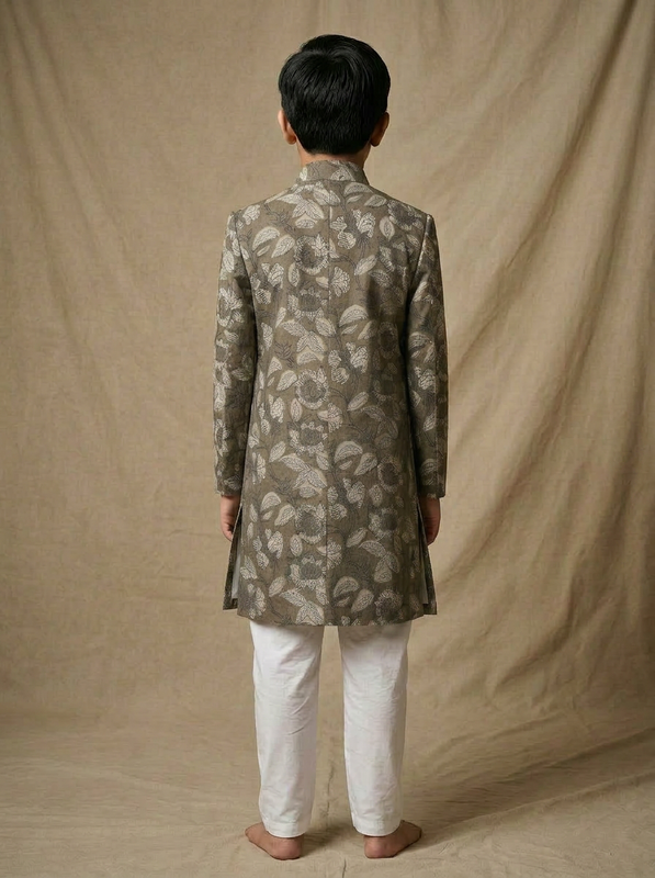 Boy wearing grey off white floral hand block printed indo western kurta with off-white pajama back view
