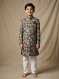 Boy wearing grey off white floral hand block printed indo western kurta with off-white pajama front view