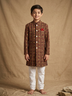 Boy wearing black red hand block printed indo western kurta with off-white pajama front view