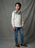 Boy wearing white cotton shirt with navy and multicolour circle dot printed yoke panel front view