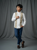 Boy wearing white cotton shirt with dual vertical floral stripe panels and mandarin collar front view