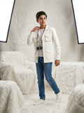 Boy wearing off white premium cotton casual jacket with quad flap pockets and NAC brand label front view