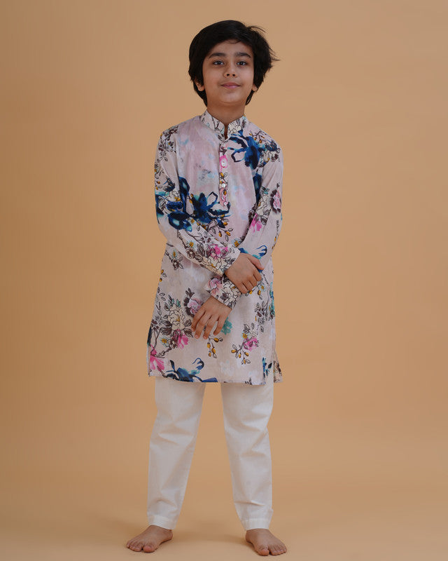Boy wearing multicolor floral boys multicolor vibrant floral print cotton kurta pajama set front view | NEW AGE CLOTHING
