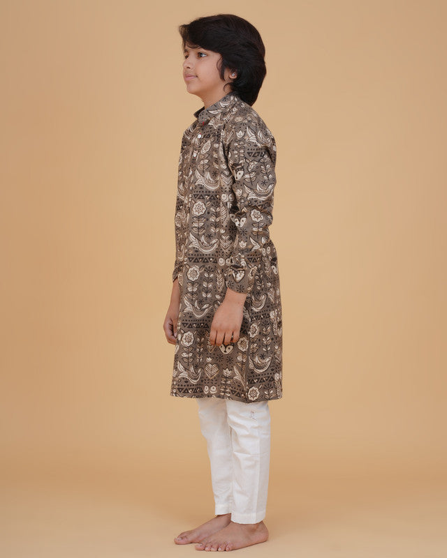Boy wearing brown boys brown vegetable dye small motifs print cotton kurta pajama set front view | NEW AGE CLOTHING
