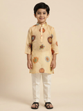 Boy wearing cream organdy multicolour floral print kurta pajama set | NEW AGE CLOTHING